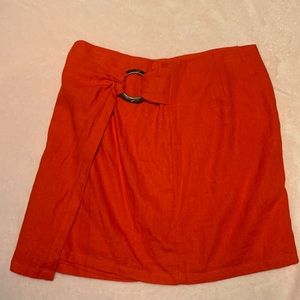 Super cute red skirt with a fun detail!